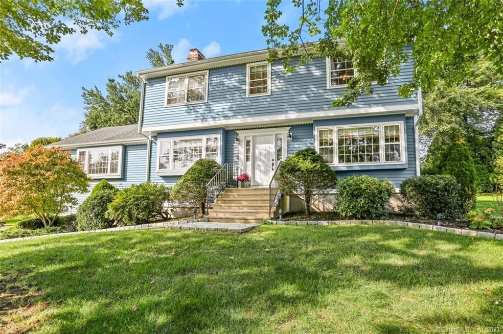 Classic center hall colonial with fabulous curb ap