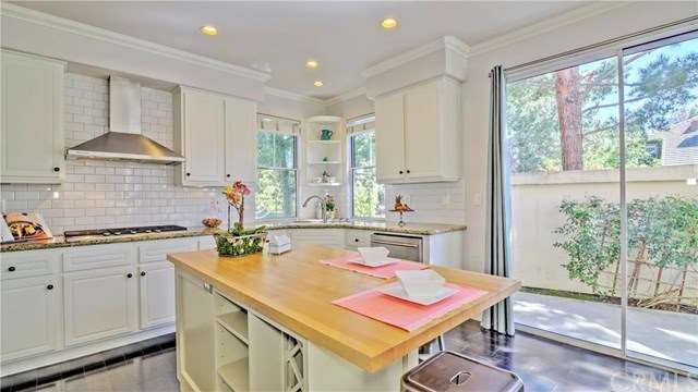 Upgraded kitchen with expanded island, subway tile