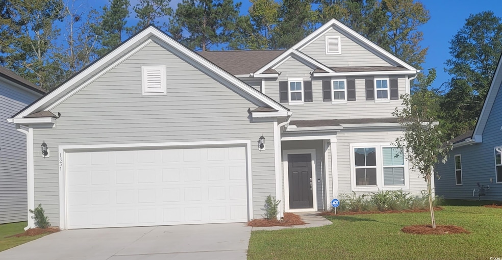 View of front of house with a front lawn