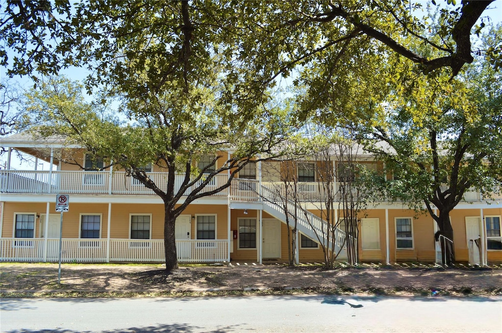 View of front of property featuring stairs