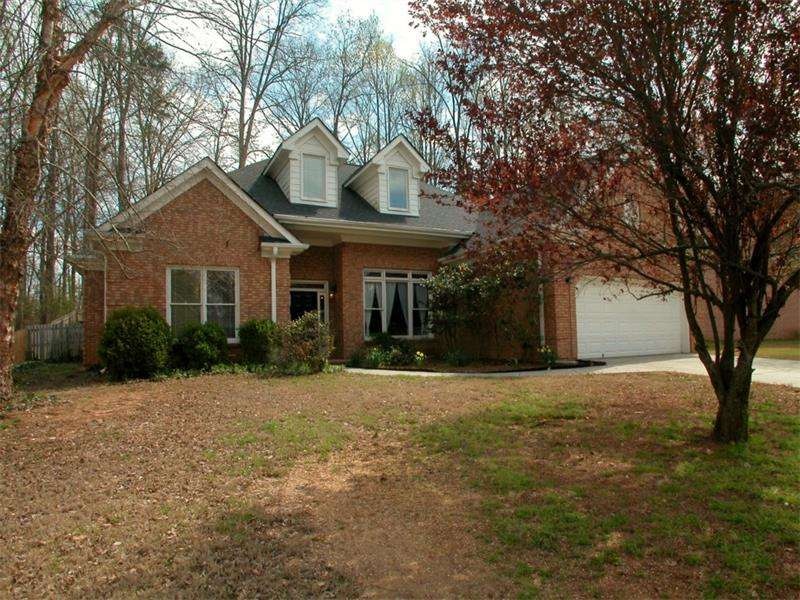 Exterior Front Four Side Brick Ranch