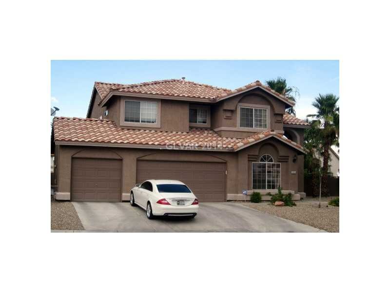 Facade/Exterior Front. 3 car garage.