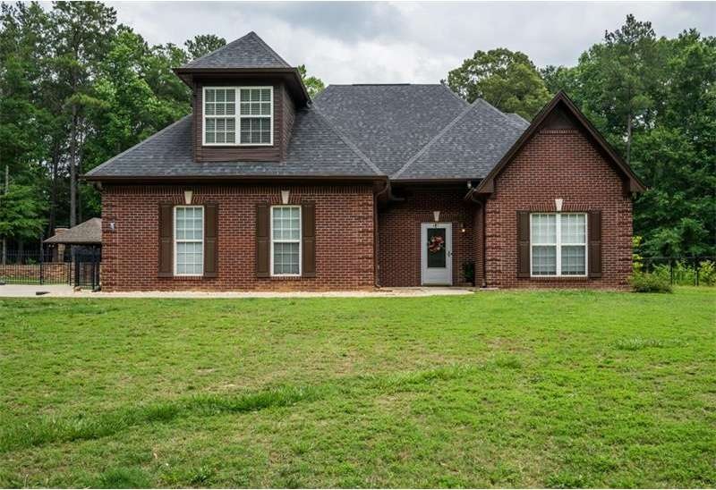 Red Brick Beauty with No HOA and Conveniently Loca