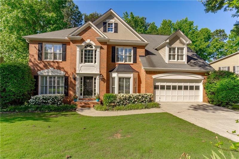 Welcome home to desired Devonhall in Shakerag!