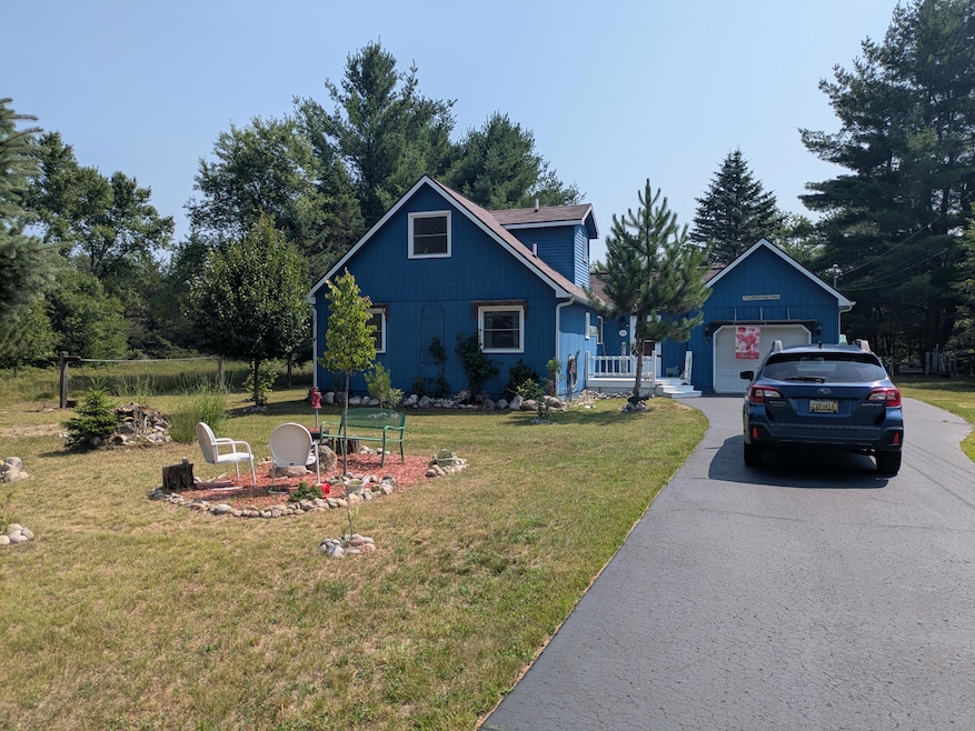 113 Whispering Pines Ct, Roscommon, MI 48653 - photo 1