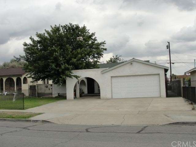 Street view with large driveway