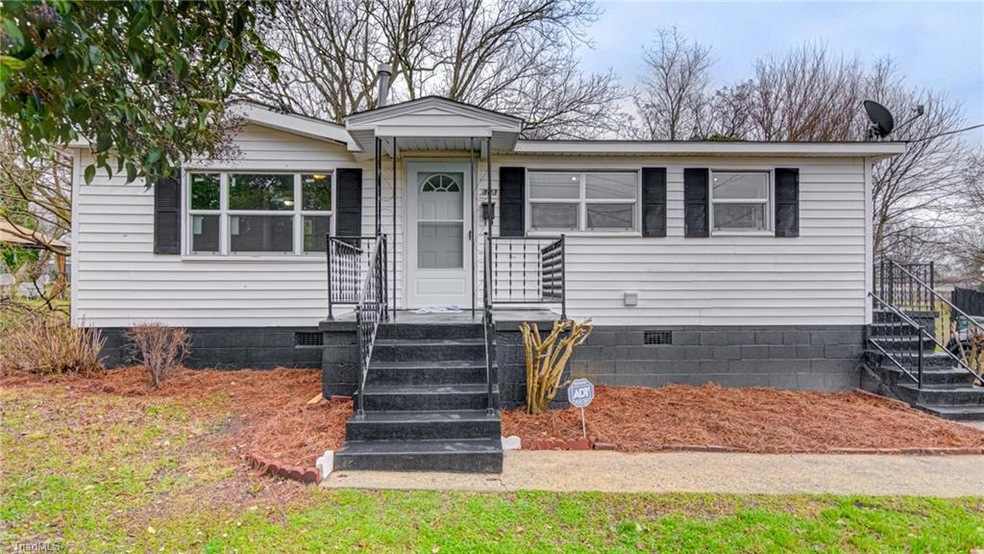 Welcome home to 303 S English Street!