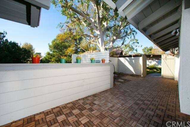 Garden accented courtyard.