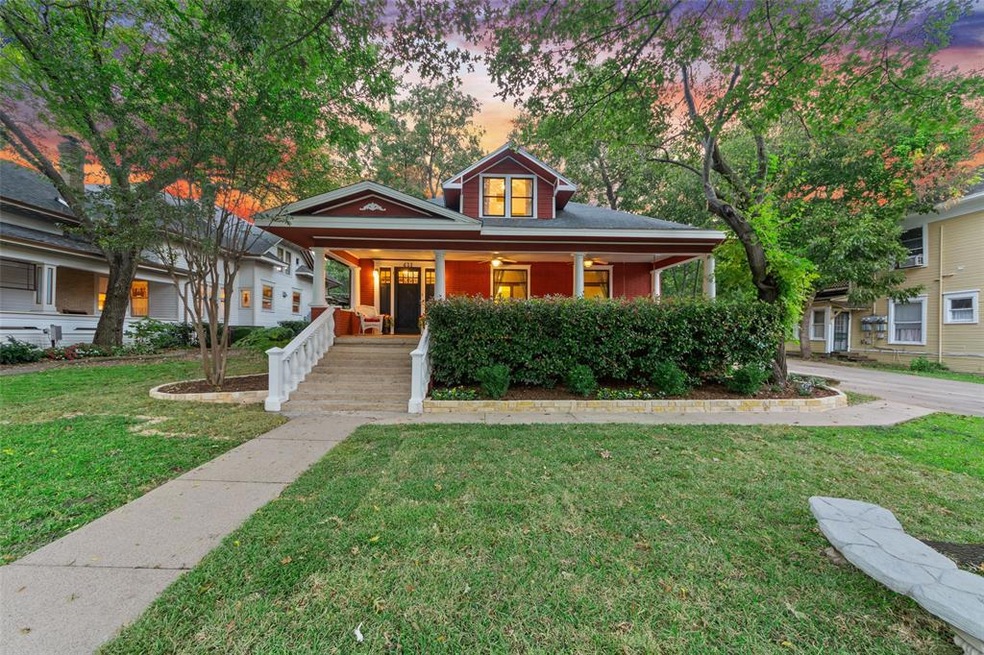 WELCOME HOME! Beautiful front porch with a swing t