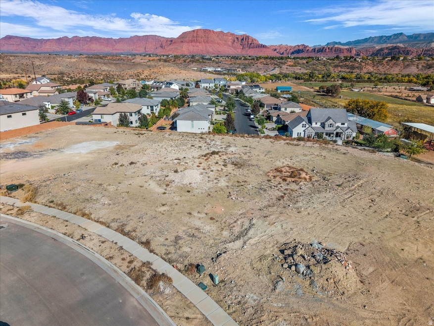 Aerial view of residential area featuring a mountain backdrop