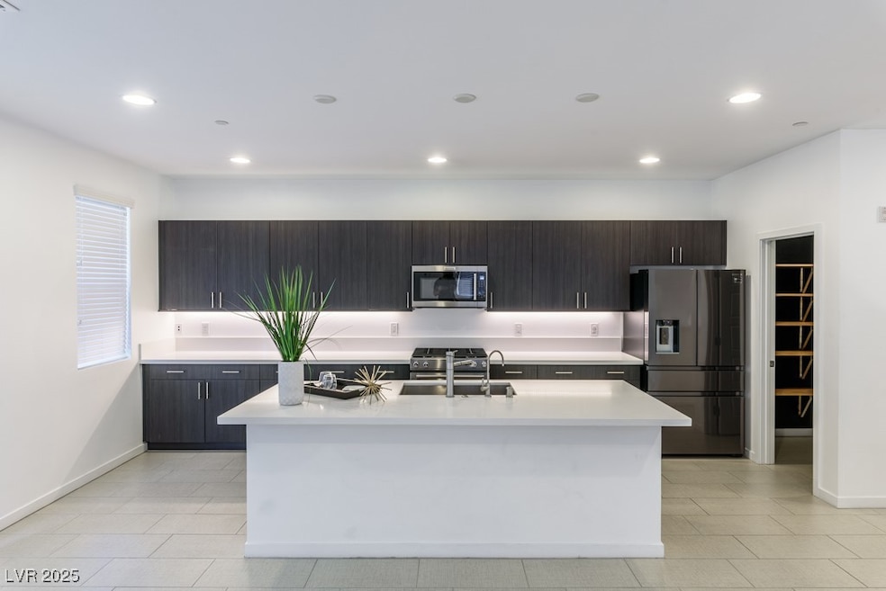Kitchen featuring appliances with stainless steel
