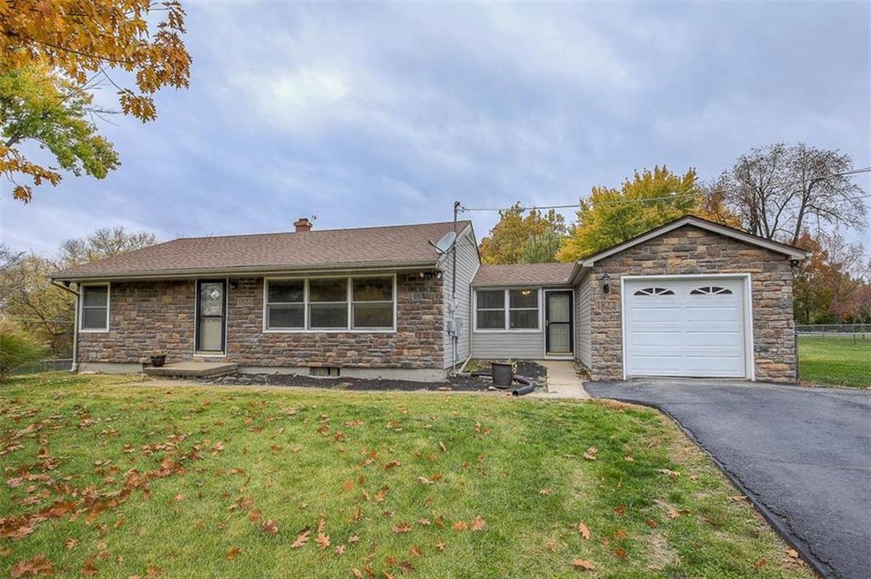 Ranch style home at 1822 E 125th Street in Kansas 