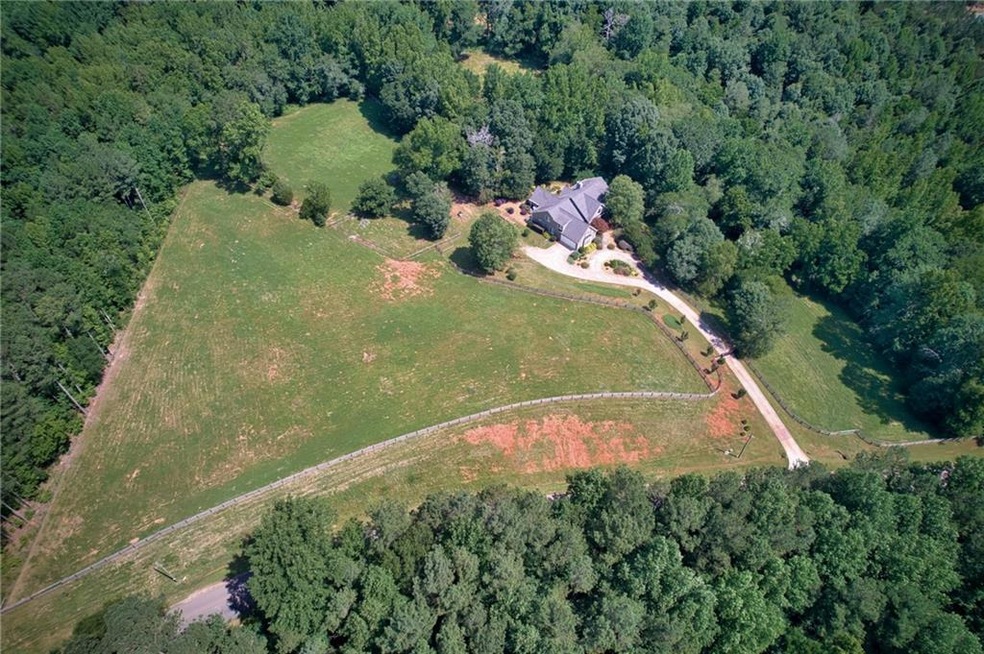 13 acres with six pasture enclosures