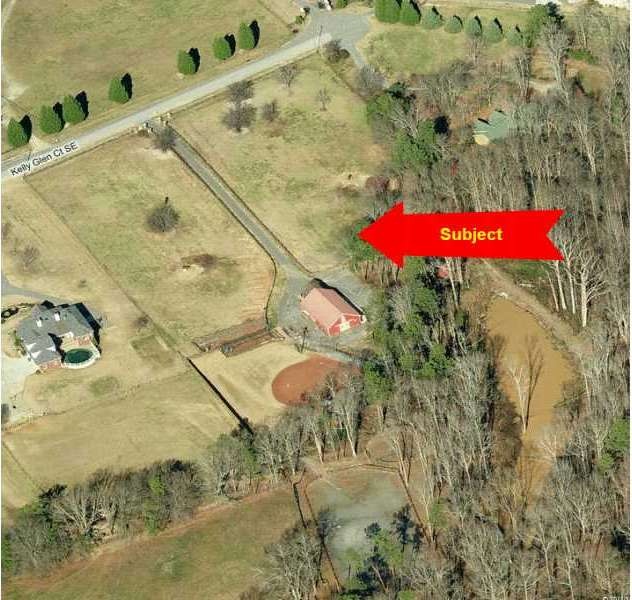 Exterior Front. Aerial of Two Horse Pastures, Base