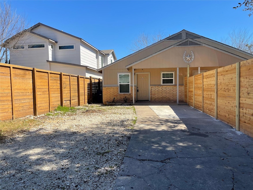 View of front of property with an attached carpor