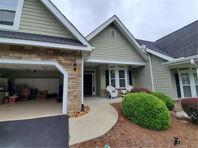 Professionally landscaped entry with beautiful stone work that will welcome you home every night