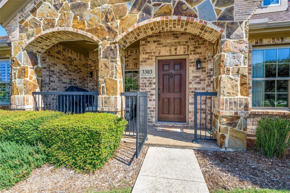 Entry with fenced front porch.