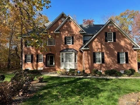 View of front of house featuring a front yard