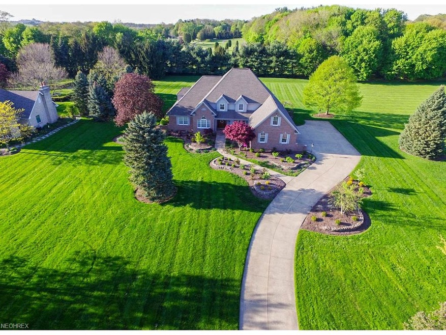 Stunning 4 bedroom, 4.5 bath situated on a 1.7 acr