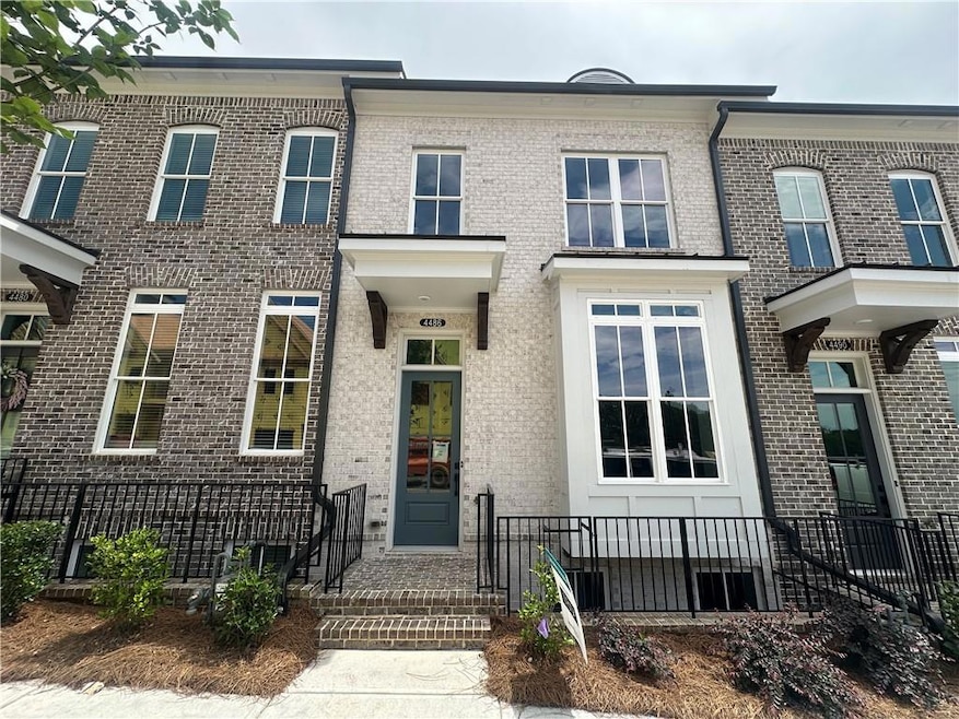 Actual homesite! Stunning brick exterior with oversized windows.