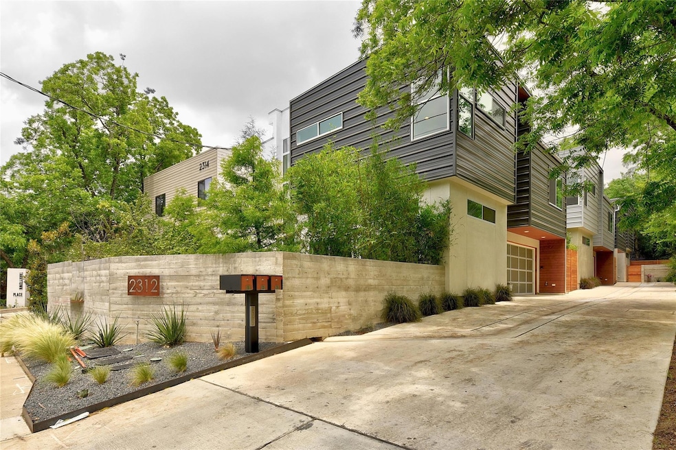 View of side of home featuring stucco siding and 