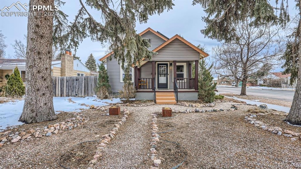 Bungalow-style house with covered porch