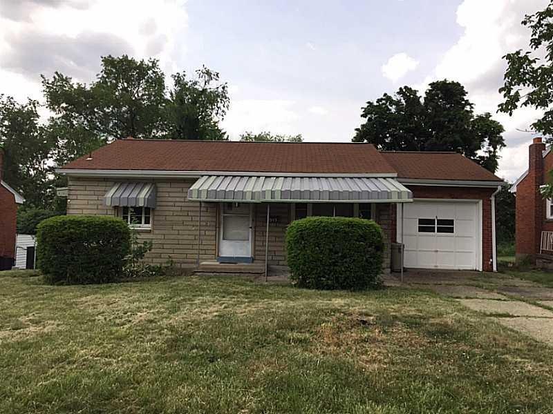 Exterior Front. Level entry, driveway leads to one