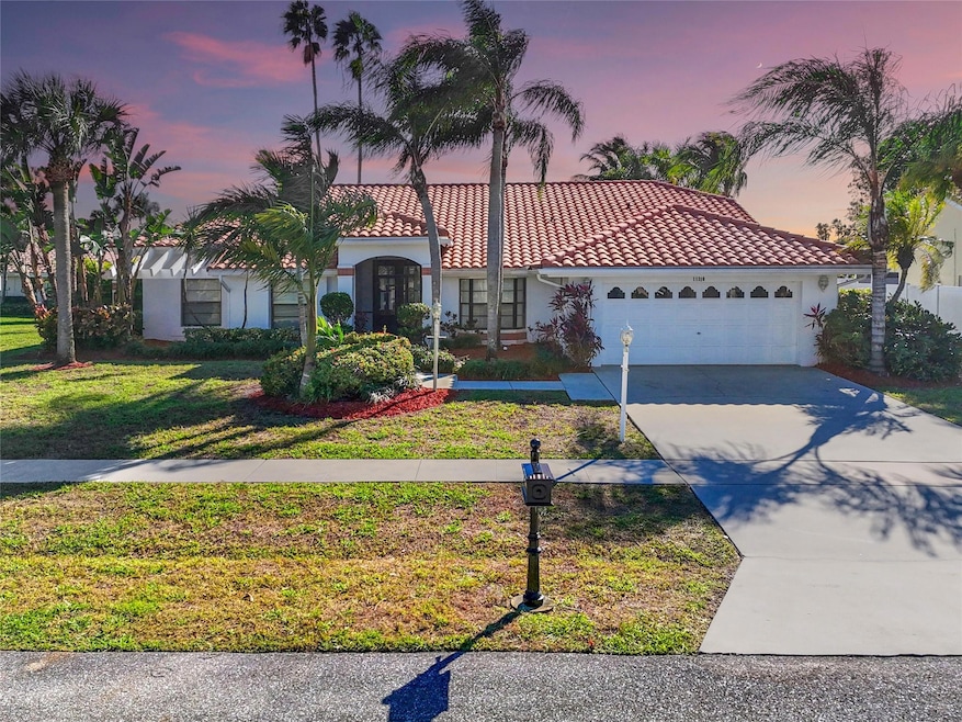 11310 Lake Tree Ct, Boca Raton, FL 33498 - photo 1