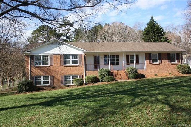 BRICK RANCH ON BEAUTIFUL HALF ACRE LOT