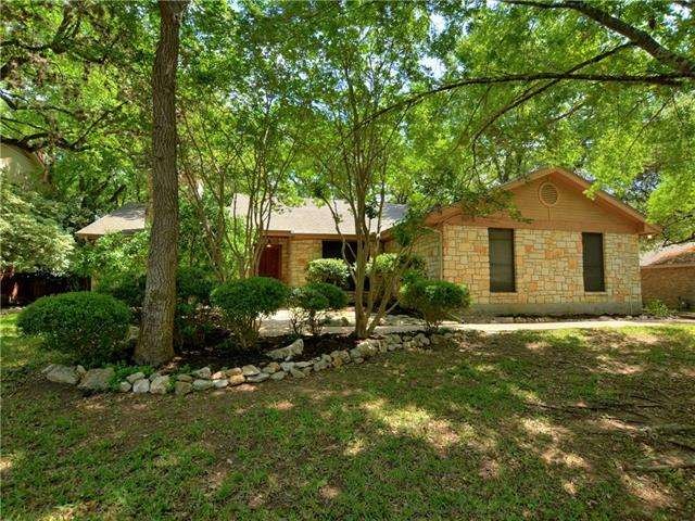 Your lovely new home nestled on 0.358 wooded acres