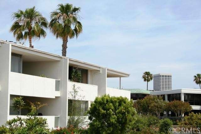 Penthouse condo in mid-century Sandcastle complex