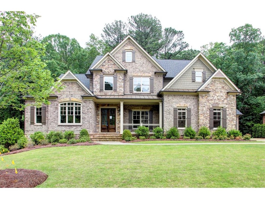 Brick and Stone Executive Home with Master on Main