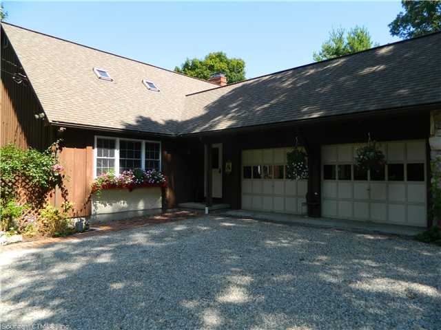 Exterior Front. Country cottage feeling in this lo