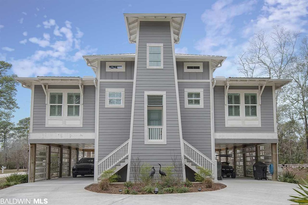 Beautiful entrance and paved patio and parking