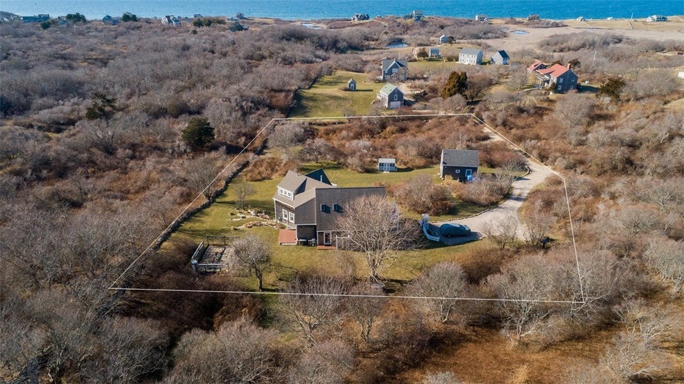 Coastal Charm situated on nearly 2 private acres w