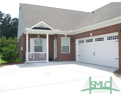 Exterior Front. One story, double car garage with 