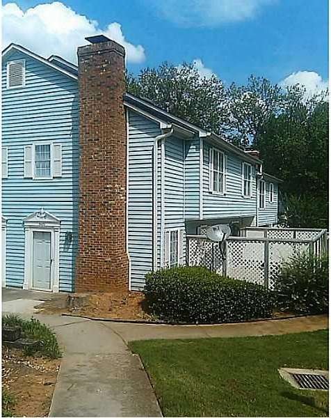 Exterior Front. beautiful landscape and walk ways