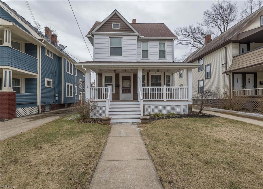 Street view of this charming 4 bedroom colonial home.