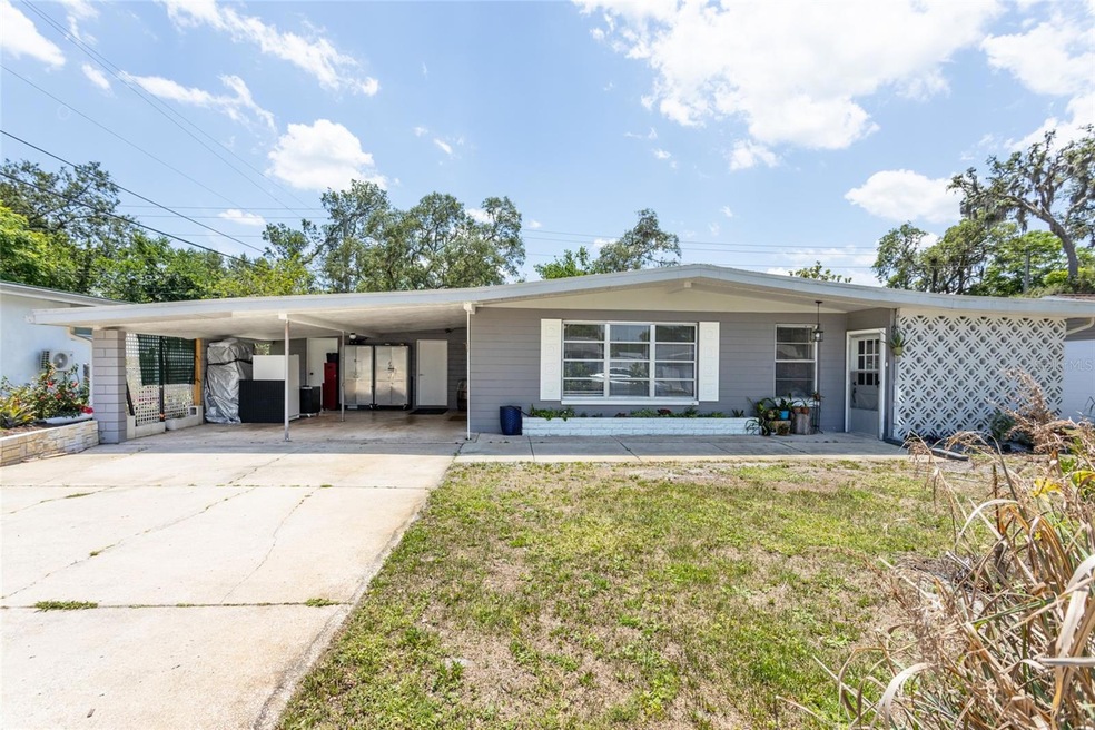 Front of home with attached carport