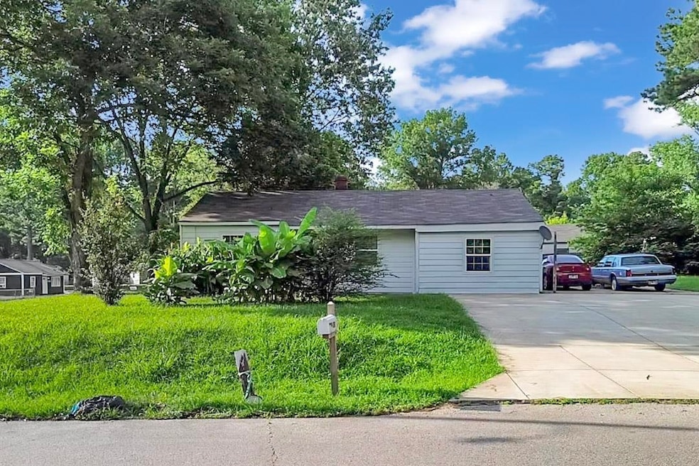 View of front of home with concrete driveway