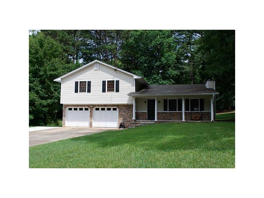 Exterior Front. Vinyl siding has been installed fo