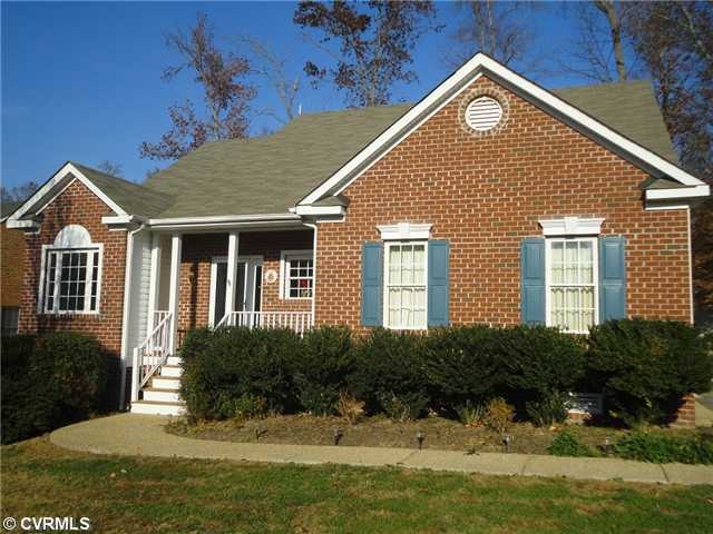 Exterior Front - Brick front with expanded covered