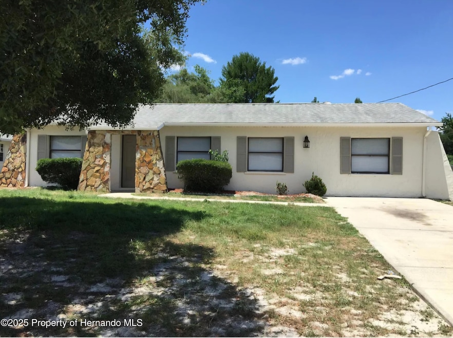 9619 Langan St, Spring Hill, FL 34606 - photo 1