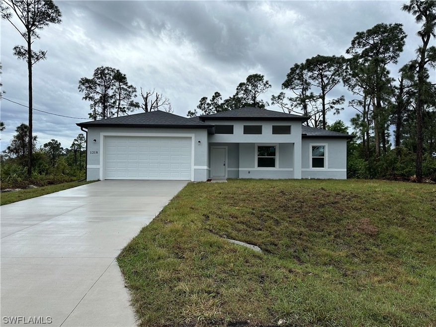 1218 Ecstasy St E, Lehigh Acres, FL 33974 - photo 1