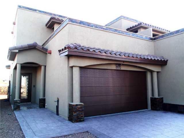 Exterior Front. Custom built duplex on t