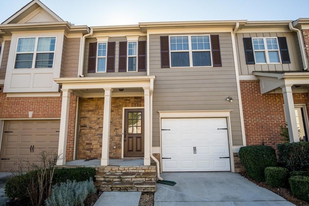 Multi unit property with an attached garage, stone