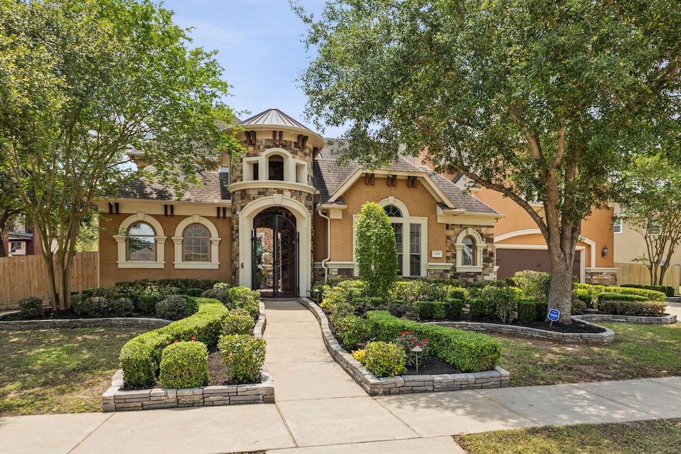Marvel at this gorgeous semi-custom-built home wit