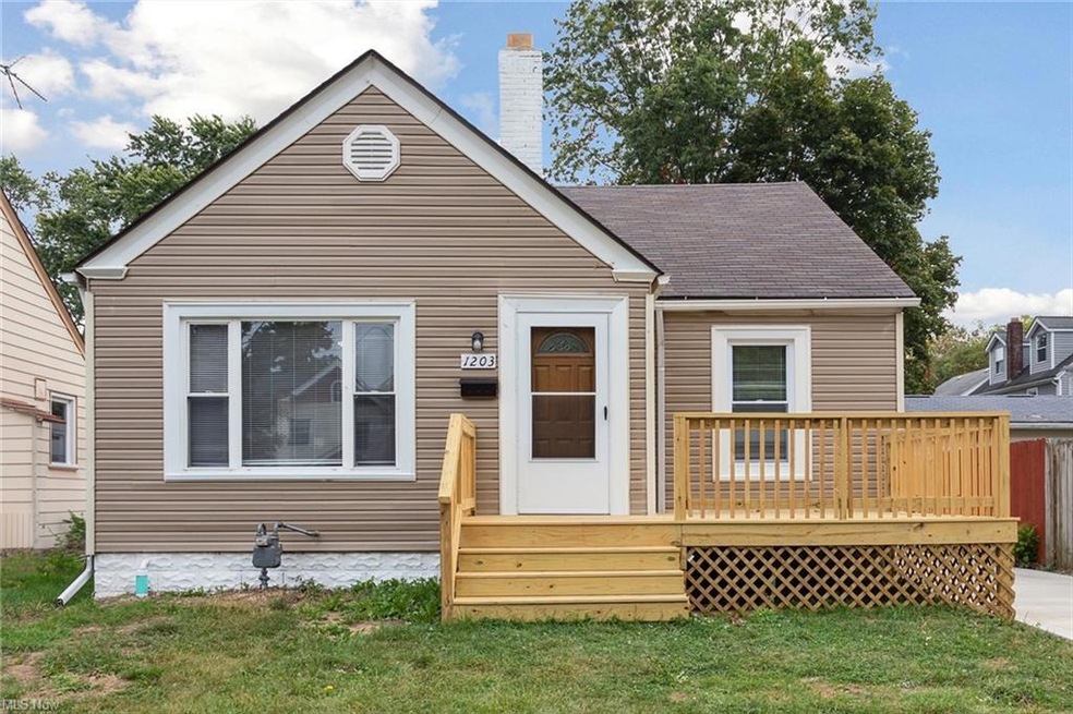 View of front of property with a deck and a front 