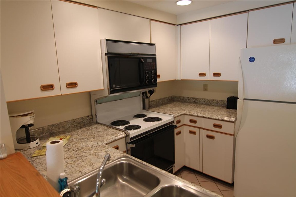 48 Cooper Memorial Dr unit 105, Lincoln, NH 03251 - photo 1