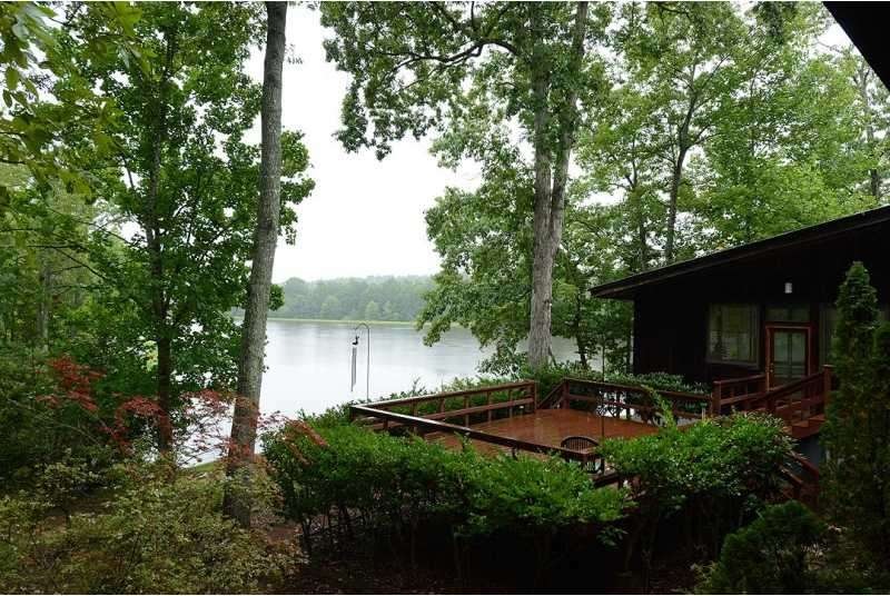 Exterior Front. Contemporary home on tranquil fish